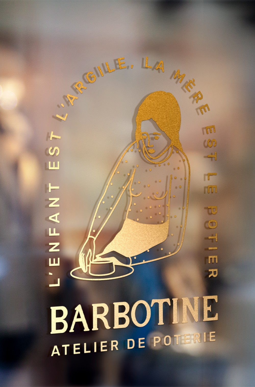 Création identité visuelle pour Barbotine. Logo sur la vitrine de l'atelier par Studio Mondessi graphiste Lorient